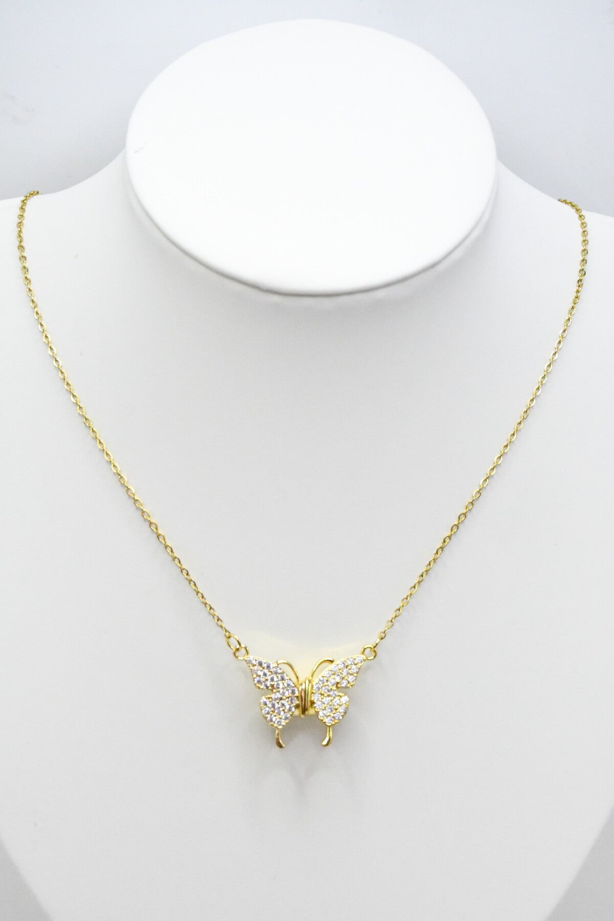 Collier papillon et strass doré