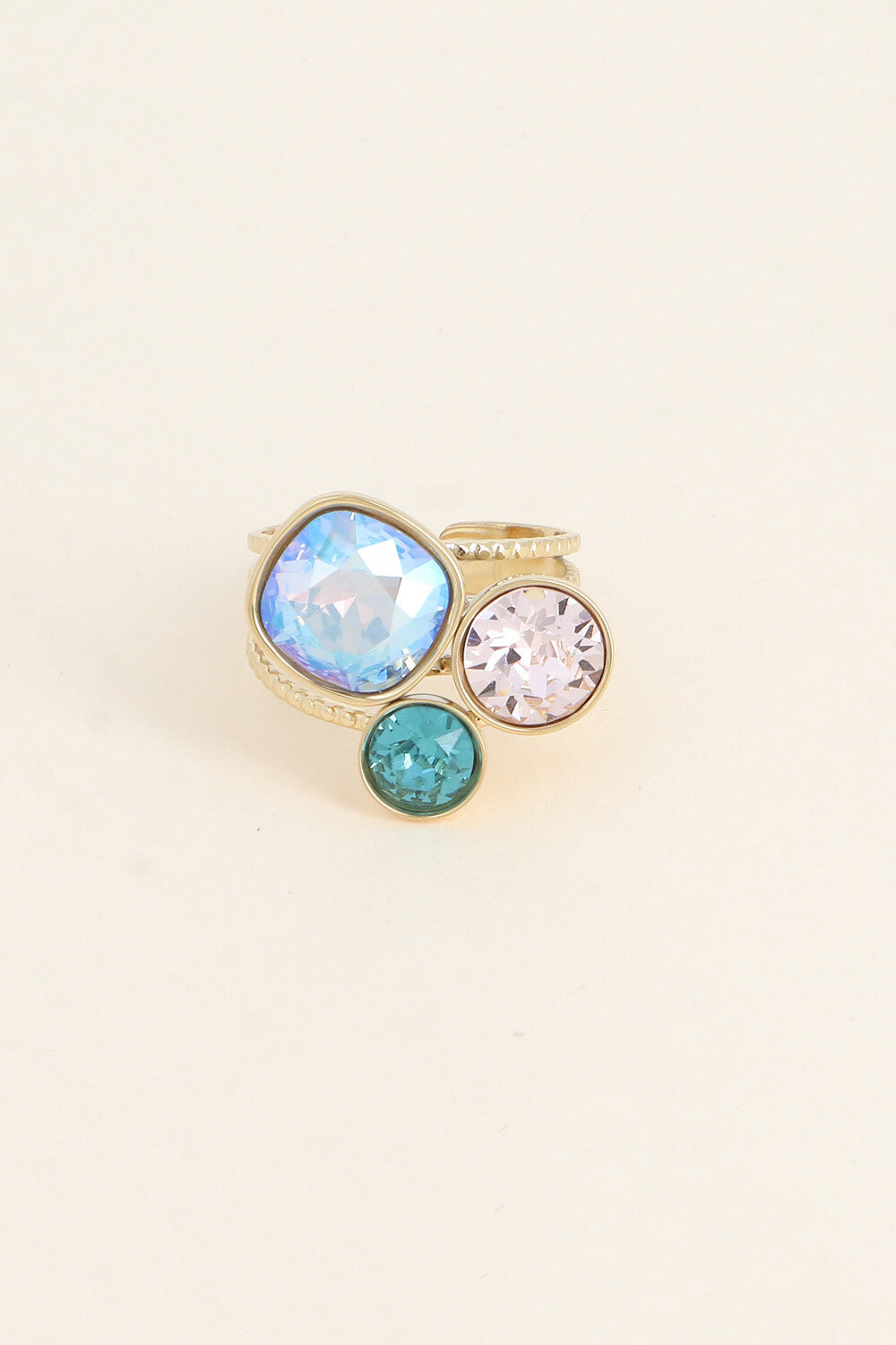 Bague trilogie dorée ornée de cristaux de Swarovski® BLEU CLAIR