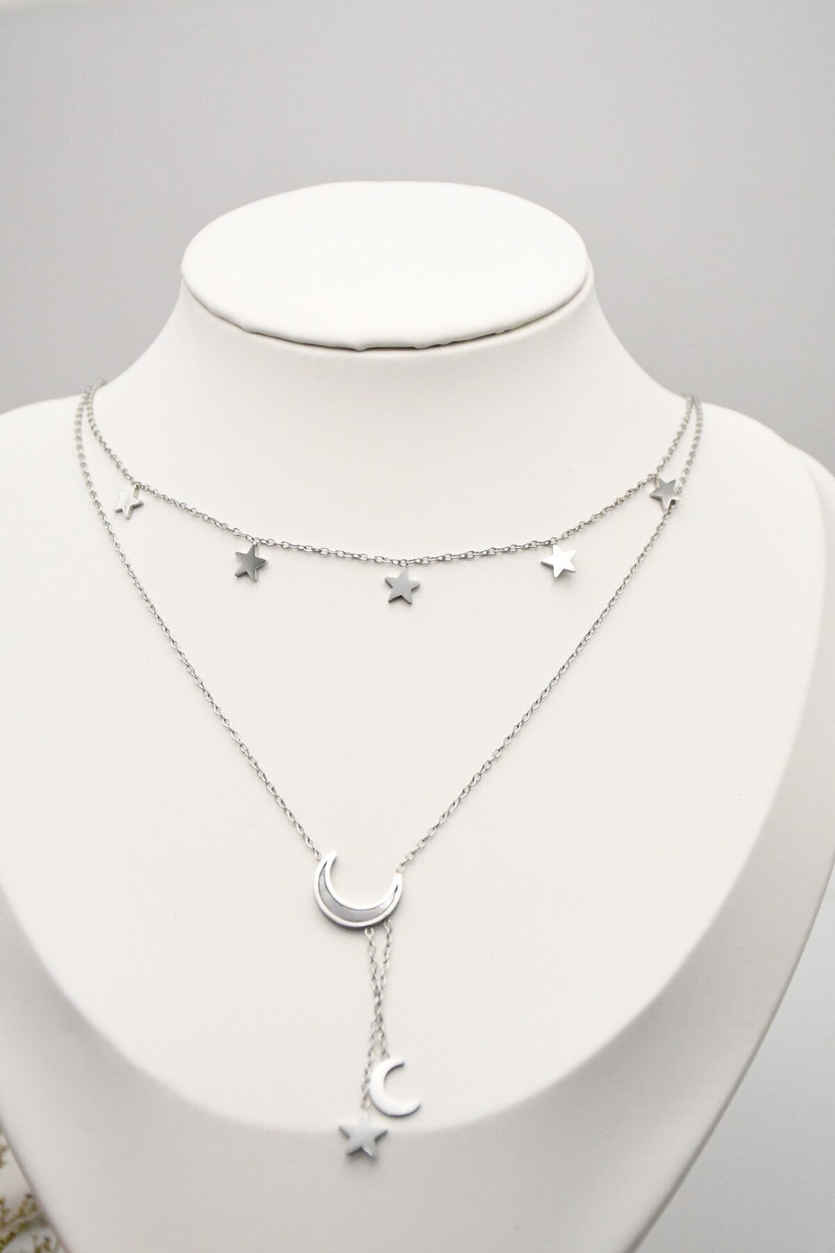 COLLIER DOUBLE CHAINES LUNES ETOILES argenté