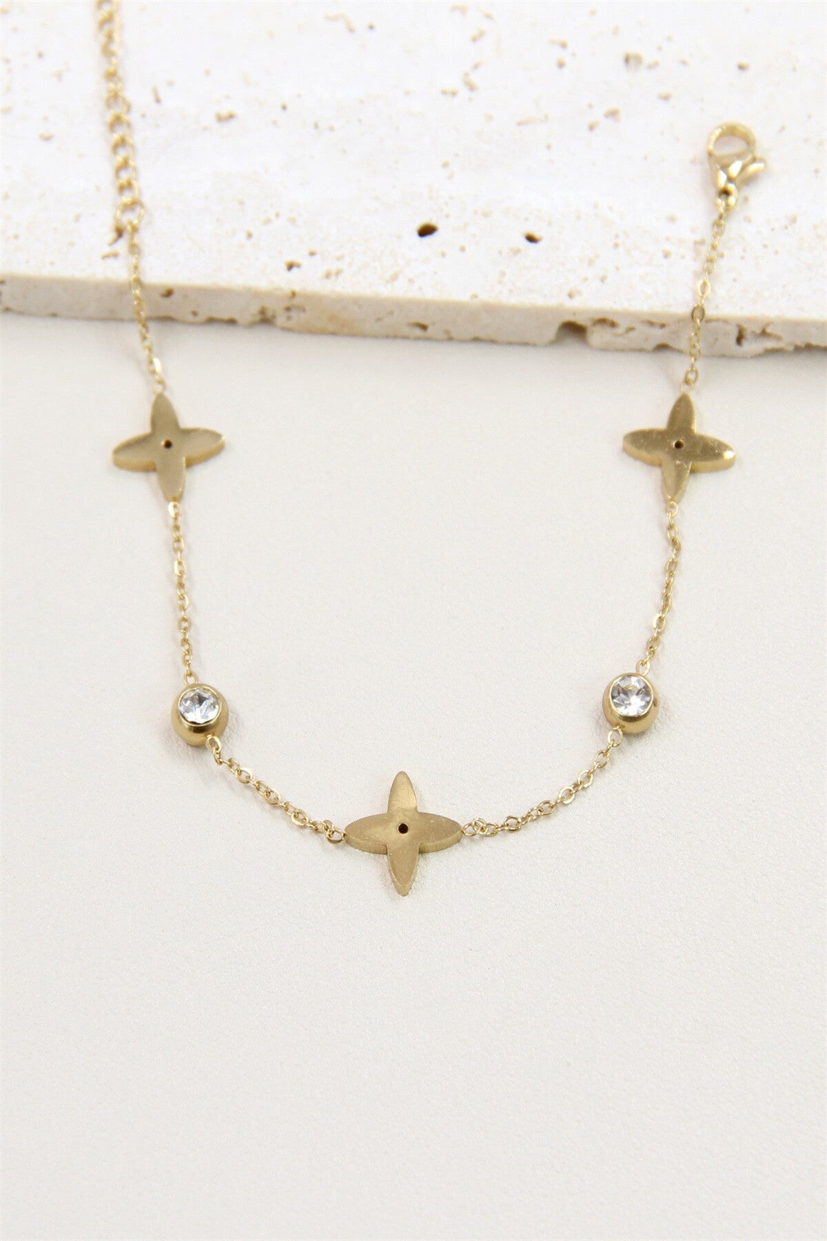 Parure étoile strass en acier inoxydable dorée